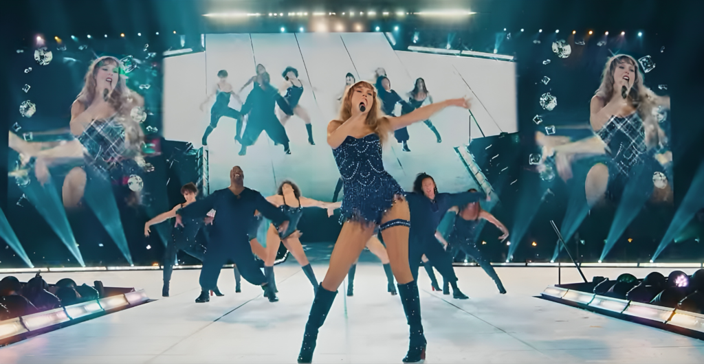 Taylor Swift performing during the 'Eras Tour', captivating fans with her surprise song segment